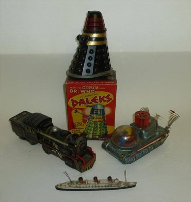 Lot 1064 - Four Mixed Toys - Marx plastic battery operated Dr Who Dalek Toy 1964, in original pictorial...