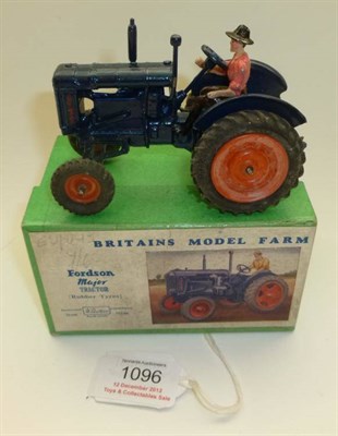 Lot 1096 - A Boxed Britains Model Farm Series Fordson Major Tractor No.128F, in dark blue, with orange...