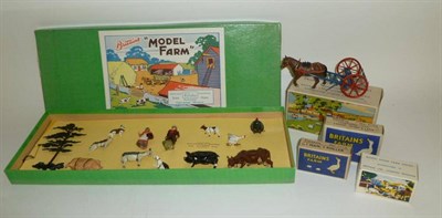 Lot 1102 - A Boxed Britains Hollowcast Lead Model Farm Set No.120F, containing farmer and wife, three...