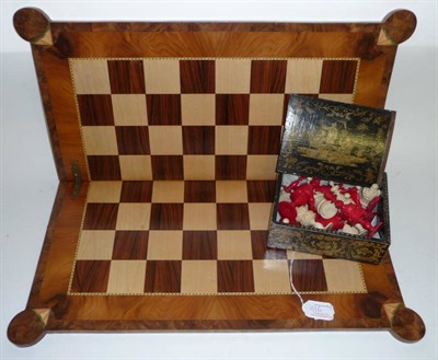 Lot 1116 - A 19th Century Ornamentally Turned Bone Chess Set, one side stained red the other left natural,...