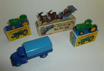 Lot 1167 - Four Diecast Vehicles - boxed Benbros Father Xmas and Sleigh (no toy sack), two boxed Matchbox...