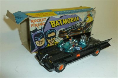 Lot 1186 - A Boxed Corgi Rocket Firing Batmobile No.267, in black, with red bat wheels, pulsing exhaust,...