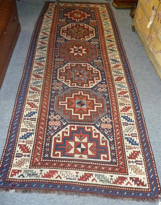 Lot 1361 - Shirvan Runner  East Caucassus  The indigo field with a column of octagons each containing a hooked