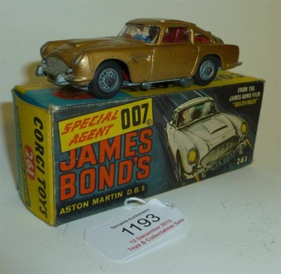 Lot 1193 - A Boxed Corgi James Bond's Aston Martin D.B.5 No.261, in gold, with red interior, ejector...