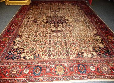 Lot 1362 - Feraghan/Mahal Carpet  West Persia The ivory field centred by an indigo pole medallion...