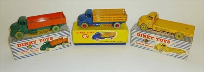 Lot 1202 - Three Boxed Repainted Dinky Commercial Vehicles - Leyland Cement Wagon No.933, Leyland Comet...