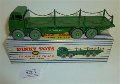 Lot 1203 - A Boxed Dinky Foden Flat Truck with Chains No.905, with dark green cab, chassis and flatbed,...