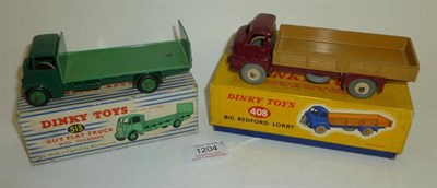 Lot 1204 - Two Boxed Dinky Commercial Vehicles:- Guy Flat Truck with Tailboard No.513, with dark green cab and