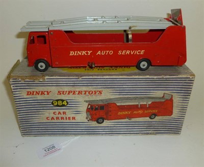 Lot 1208 - A Boxed Dinky Supertoys Car Carrier No.984, in red with grey decks, blue striped box