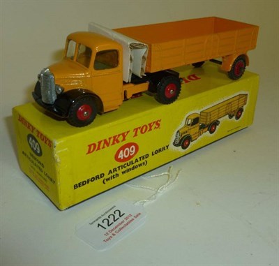 Lot 1222 - A Boxed Dinky Bedford Articulated Lorry with Windows No.409, with yellow cab and back, black wings