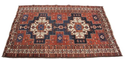 Lot 1366 - Afshar Carpet  South Persia The indigo field with two stepped medallions surrounded by tribal...