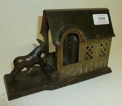 Lot 1244 - An Original 19th Century Cast Iron 'Mule Entering Barn' Mechanical Money Bank, with enamelled...