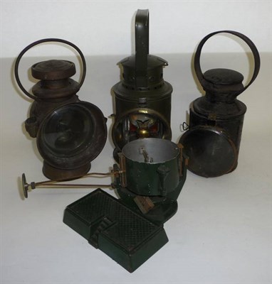 Lot 1273 - Three Transport Lamps, comprising an LMS tinplate signalling lamp, a brass car lamp and a...