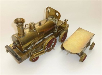 Lot 19 - A 3 1/4inch Gauge Live Steam Brass 2-2-2 Dribbler Locomotive, with steam whistle, wooden insert...