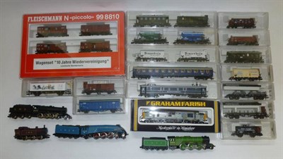 Lot 31 - A Collection of 'N' Gauge Trains, comprising three unboxed Grafar locomotives, unboxed Trix...