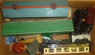 Lot 52 - A Collection of Hornby 'O' Gauge Trains and Accessories, including two incomplete 0-4-0 locomotives