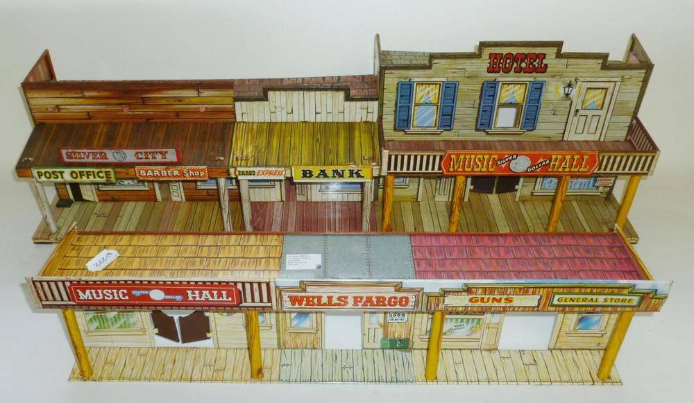 Lot 81 - A Marx Lithographed Tinplate Roy Rogers Wild West Town, in two pieces, buildings include Wells...