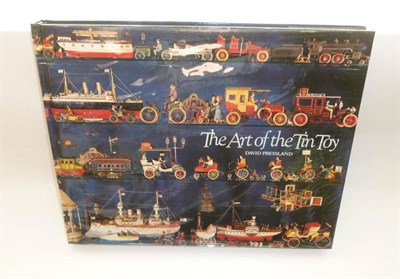 Lot 90 - Book - The Art of The Tin Toy by David Pressland, as new with cellophane wrapper and slip case