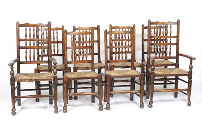 Lot 1382 - A Matched Set of Eight Lancashire Ash Spindle Back Chairs, the wavy shaped top rails above...