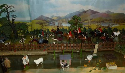 Lot 129 - A Britains Hollowcast Lead Fox Hunt Diorama, including mounted hunt figures, walking hunt...