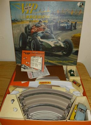 Lot 141 - A Boxed VIP New Raceways Slot Car Racing Set R1 by Victory Industries, containing track, cars,...