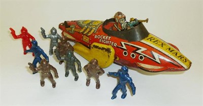 Lot 157 - A Marx Clockwork Tinplate 'Rex Mars Rocket Fighter' Space Ship, lithographed in red and yellow...