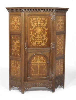 Lot 1388 - An Arts and Crafts Shapland and Petter Oak and Marquetry Wardrobe, the moulded and segmented dentil