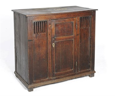 Lot 1390 - An Early 18th Century Joined Oak Food Cupboard, the rectangular top over a fielded panel...