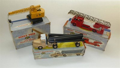 Lot 240 - Three Boxed Dinky Supertoys - Turntable Fire Escape No.956, Tracteur Saharien No.893 & Coles Mobile