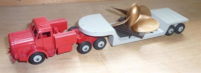 Lot 242 - A Boxed Dinky Supertoys Mighty Antar Low Loader with Propeller No.986, with red cab, grey back,...