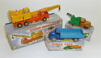 Lot 248 - Three Boxed Dinky Supertoys - Comet Wagon No.932, in two-tone blue, Breakdown Lorry No.430 and...