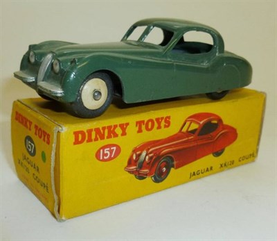 Lot 251 - A Boxed Dinky Jaguar XK120 Coupe No.157, with dark sage green body, cream hubs, in correct box