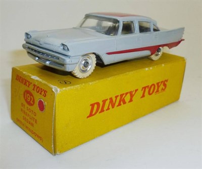 Lot 254 - A Boxed Dinky De Soto Fireflite Sedan No.192, with grey body, red roof and flash, in plain card box