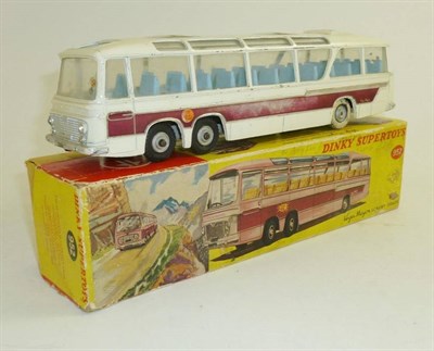 Lot 265 - A Boxed Dinky Supertoys Vega Major Luxury Coach No.952, with white body, red flashes, blue...