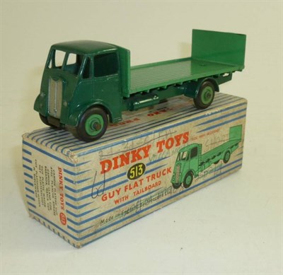 Lot 271 - A Boxed Dinky Guy Flat Truck with Tailboard No.513, with dark green cab and chassis and light green