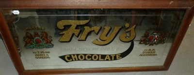 Lot 283 - A Fry's Chocolate Advertising Mirror, with gilt lettering and decorated with two Royal Coats of...