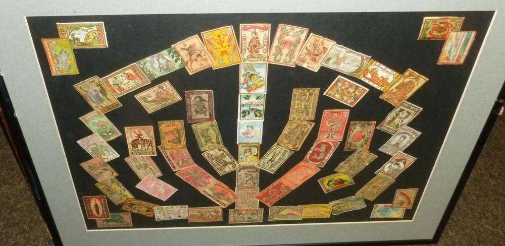 Lot 301 - A Large Collection of Vintage Matchbox Labels, mounted in attractive displays into nineteen...