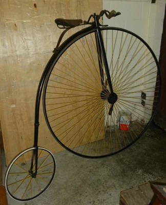 Lot 316 - A Penny Farthing or Penny Ordinary Bicycle, with black painted tubular frame, curved handlebar with