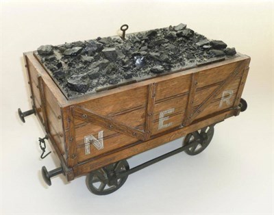 Lot 326 - A North Eastern Railway Coal Wagon Smoker's Compendium, with riveted oak body, N.E.R....