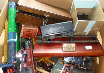 Lot 35 - A Collection of 'O' Gauge Trains and Accessories, including sixteen Hornby wagons and tankers,...