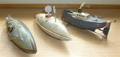 Lot 94 - Two Small Clockwork Tinplate Submarines, one German made, the other from Gamages; A Small Clockwork