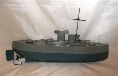 Lot 96 - A Sutcliffe Clockwork Tinplate Model Warship, with two tone grey hull and superstructure, six...