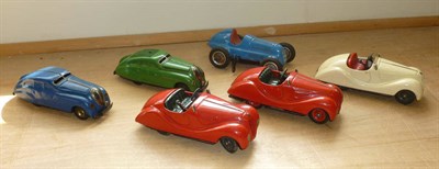 Lot 97 - Six Schuco Clockwork Tinplate Cars - Studio 1050 in blue, Examico 4001 in red, Akustico 2002 in...