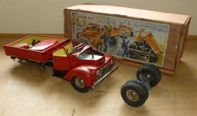 Lot 99 - A Boxed Gama Clockwork Tinplate 501 Pick-Up Truck, in red with yellow interior, instruction...