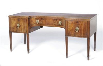 Lot 1415 - A George III Mahogany and Ebony Strung Sideboard, circa 1790, the rectangular top above a...