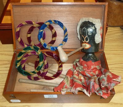 Lot 163 - A Late 19th Century Wooden 'Parlour Aunt Sally' Hoop-La Game, comprising a black painted doll...