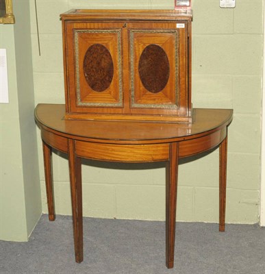 Lot 1419 - An Unusual Satinwood, Ebony Strung and Burr Elm Writing Table, the upper section with a fall...