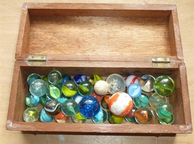 Lot 181 - A Collection of Vintage Marbles, in two boxes and a wooden solitaire board