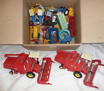 Lot 188 - A Collection of Britains Farm Vehicles and Machinery, in plastic and diecast, including...