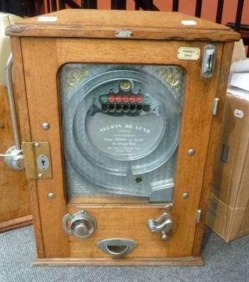 Lot 204 - An Oak Cased Allwin Deluxe Spin a Win Amusement Machine, numbered 248, Brit Pat No.29915/13,...